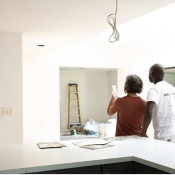 Professional painter helping a homeowner select paint colors for the home