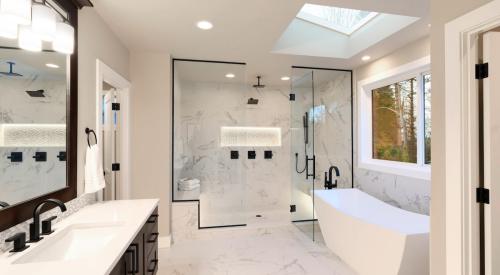 White modern spa-like bathroom with large shower and bathtub