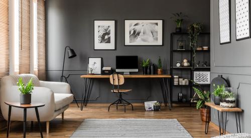 A home design that includes a gray and white home office for working from home